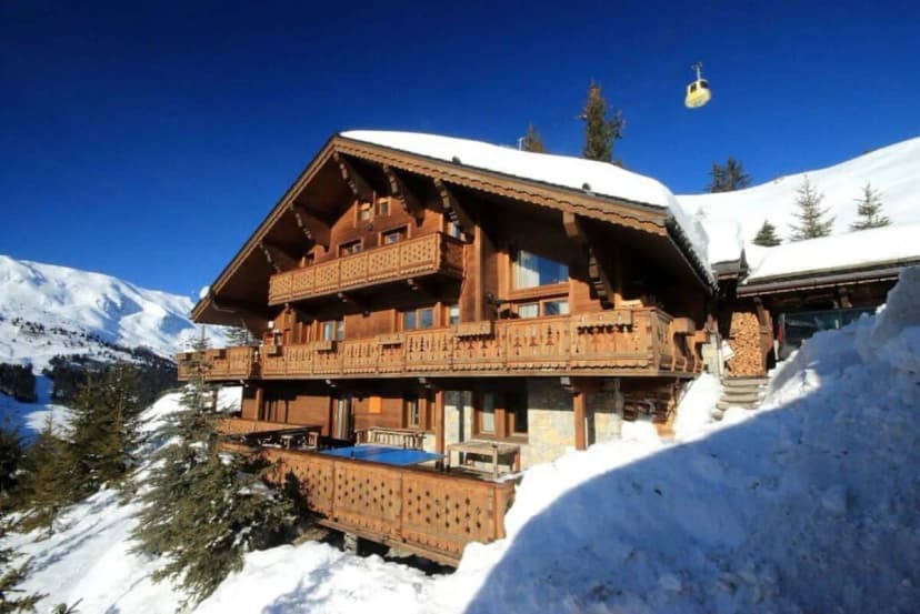Prominent Soft Blue Chalet in the Alps