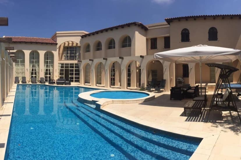 Tuscan-Style Villa Surrounded by Olive Trees