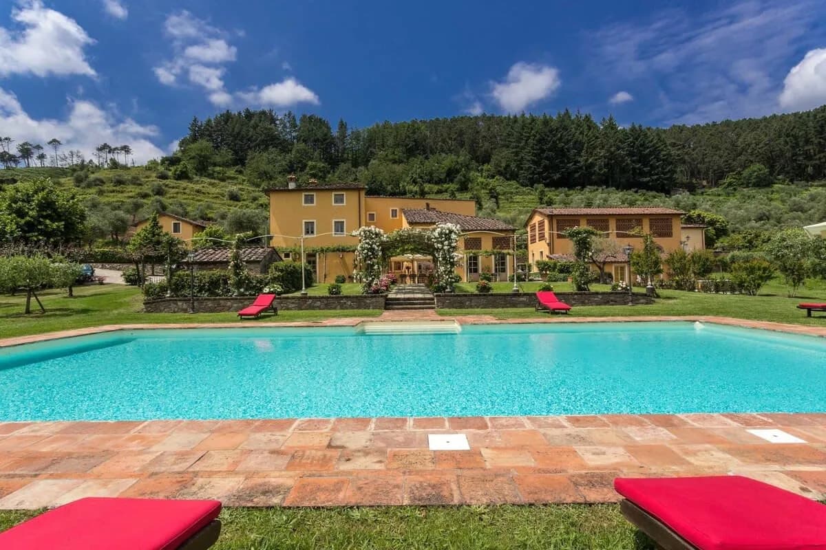 Traditional Tuscan Villa Surrounded By Olive Groves And Orchards