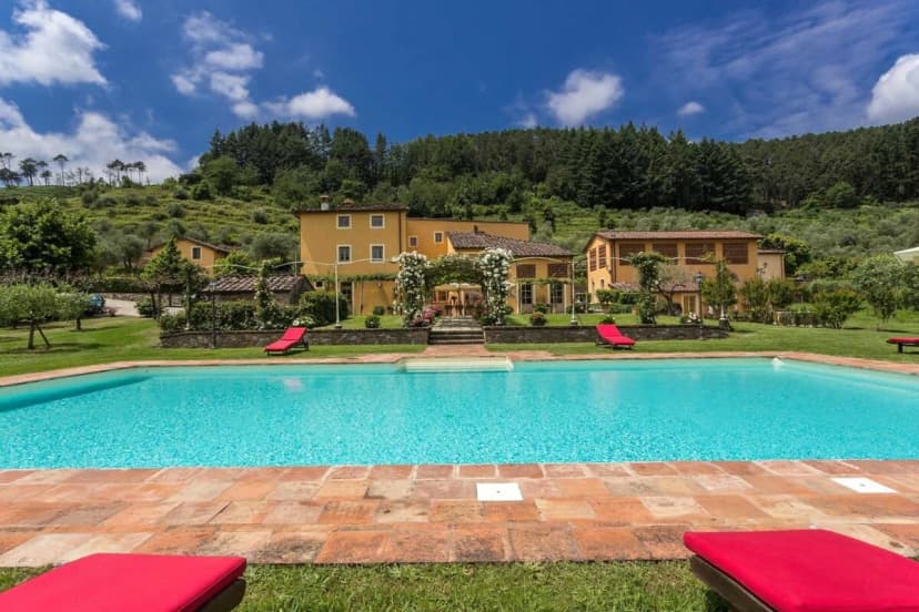 Traditional Tuscan Villa Surrounded By Olive Groves And Orchards