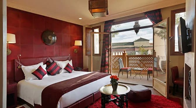 Relaxing Room With Private Balcony And Garden View