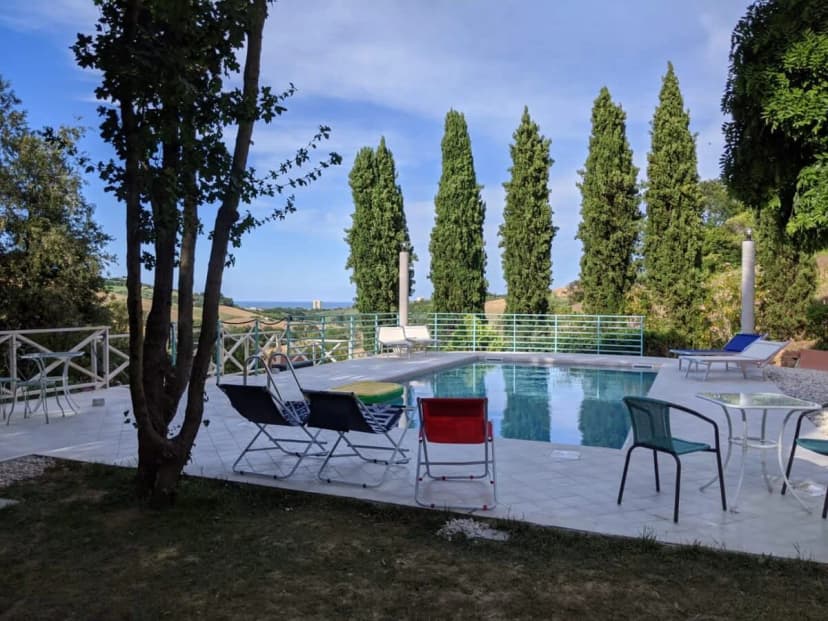 Seafront Villa Surrounded By Hill Full Of Trees