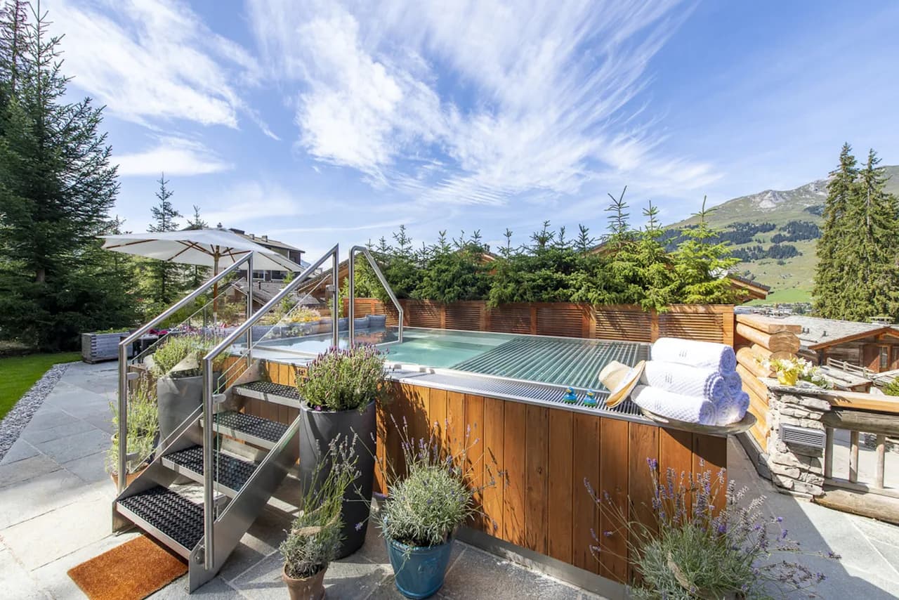 A DREAMY CHALET RETREAT PERCHED ON THE MOUNTAINSIDE ABOVE VERBIER photo 2