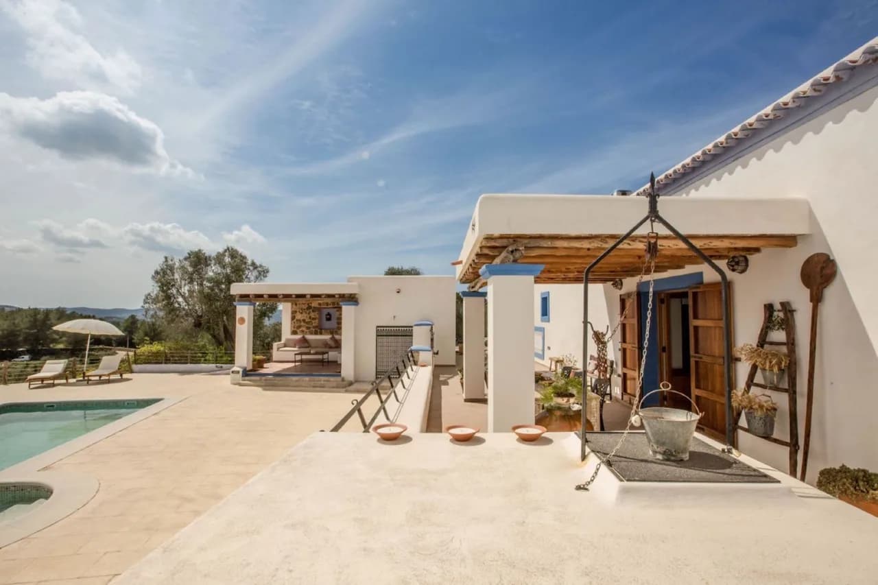SITUATED ON A HILLSIDE JUST OUTSIDE THE VILLAGE OF SAN JUAN WITH SUNSET VIEWS OF BENIRRAS BAY photo 2