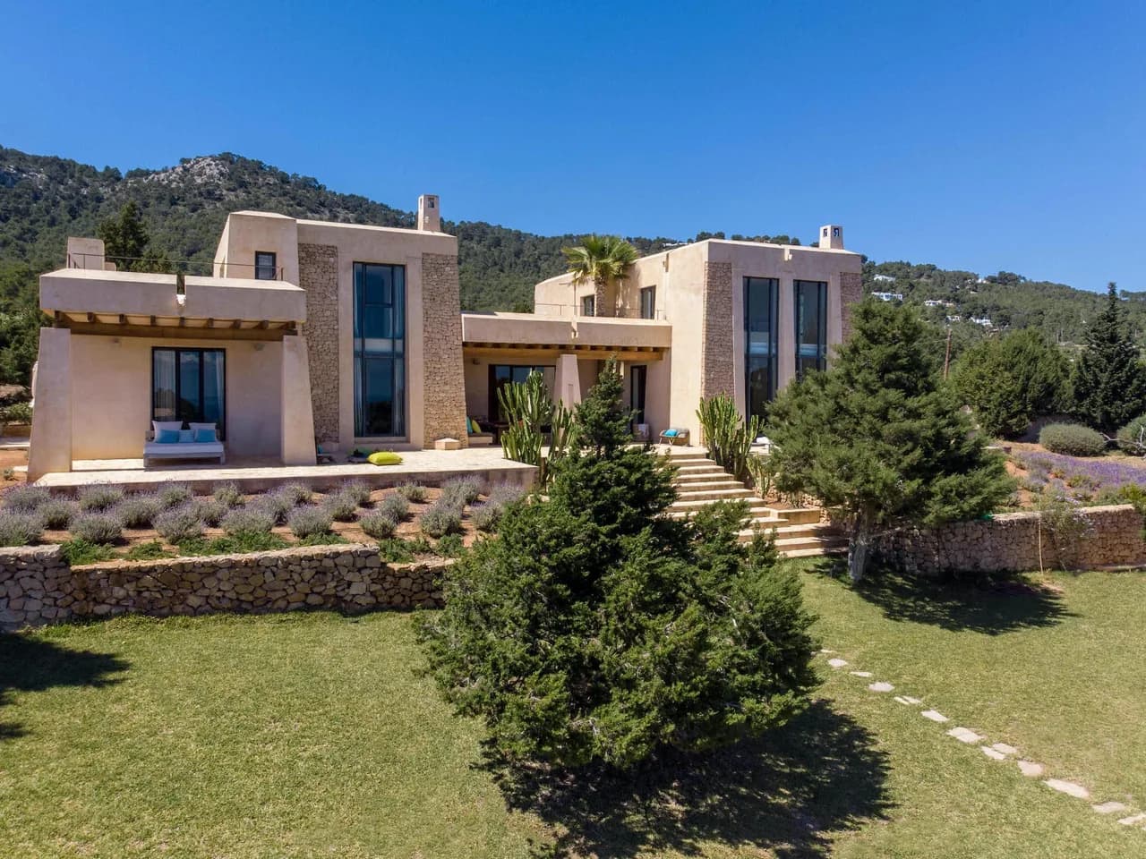 A modernist fortress with bohemian interior in a fantastic Es Cubells location photo 2