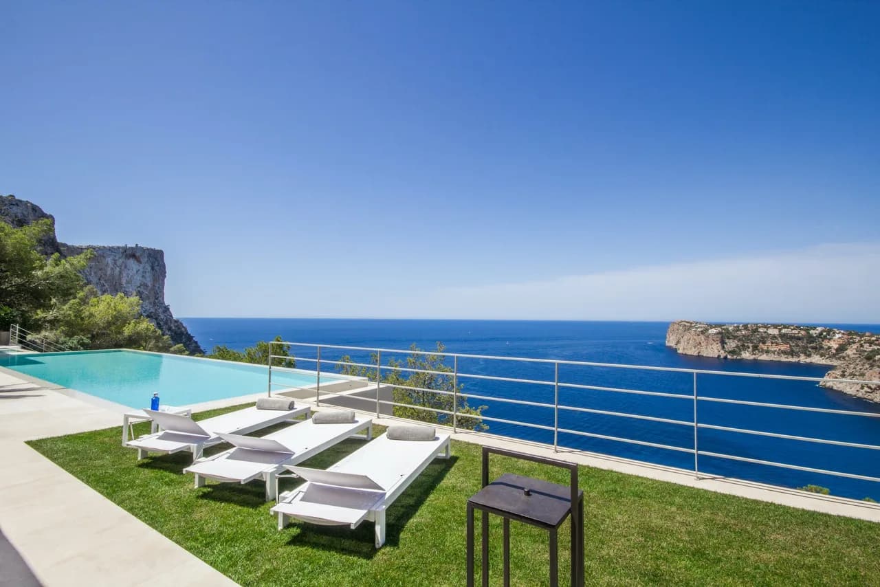 The stunning sunset villa is located on a beautiful plot on the slopes of the Cala Llamp photo 2