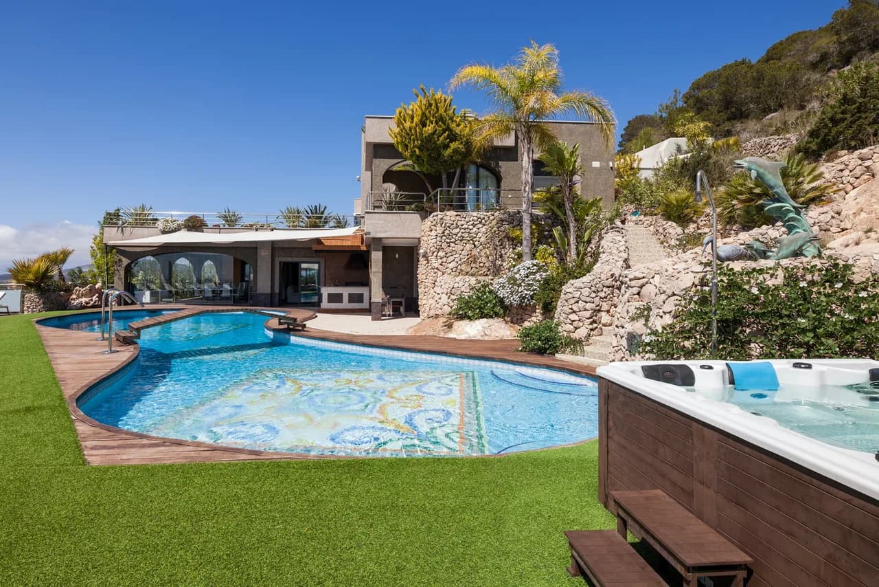 Modern villa with a classic feel, located on a mountain top with stunning country and sea views.
