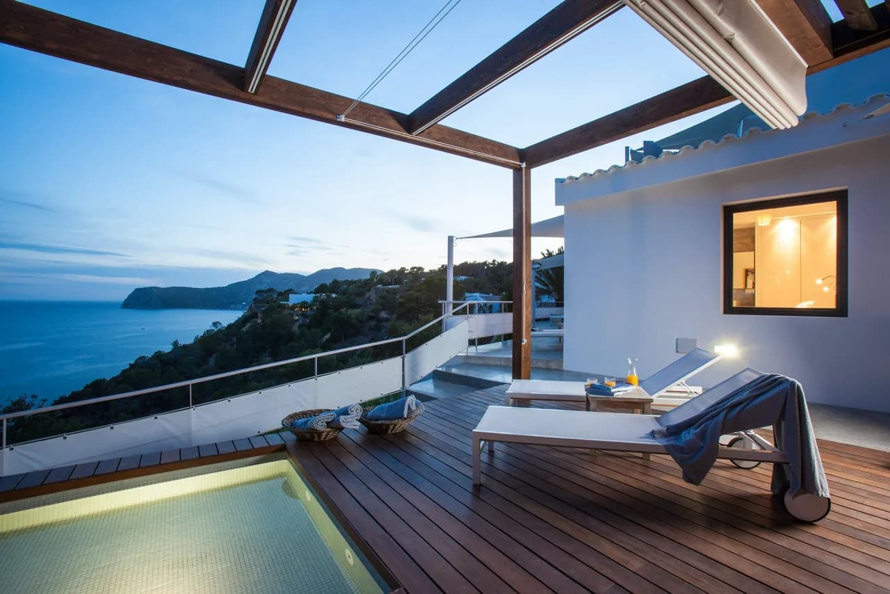 Beautiful contemporary villa with gorgeous views across the crystalline clear waters of Es Cubells photo 2
