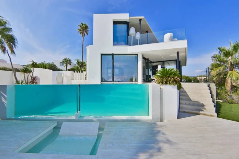 Striking Ibizan Villa Perched on a Clifftop Near San José