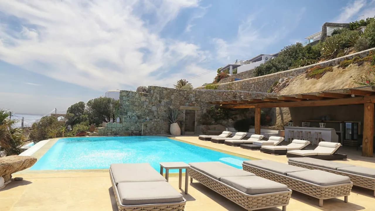 Premium Location Luxury Villa Right Above The Famous Psarou Beach photo 3