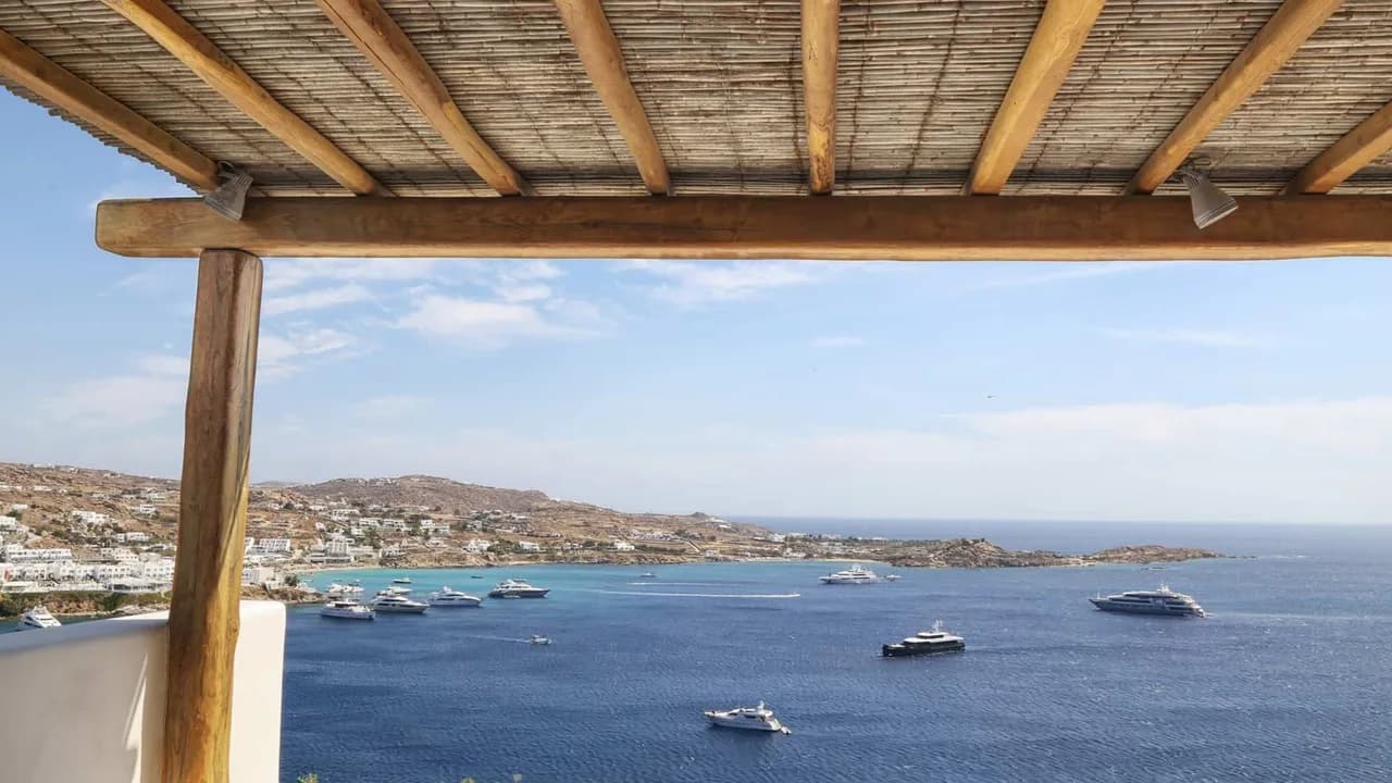 Premium Location Luxury Villa Right Above The Famous Psarou Beach photo 4