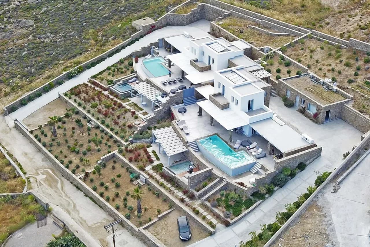 White-and-stone Beauty With Incredible Views Over The Aegean Sea