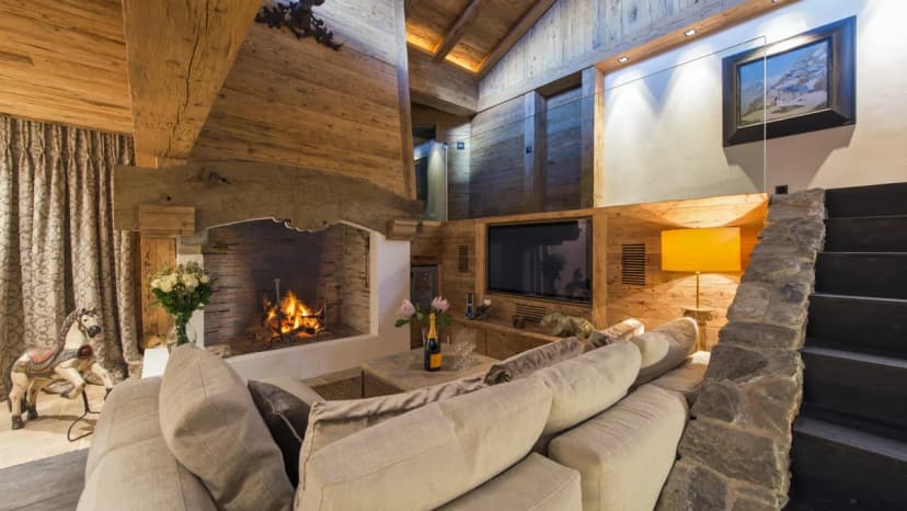 Contemporary chalet sits majestically on the banks of a pond
