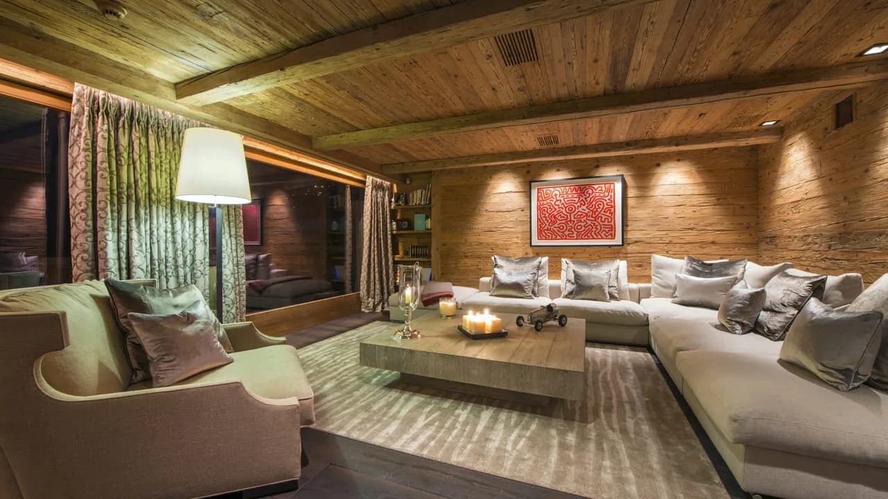 Contemporary chalet sits majestically on the banks of a pond photo 4