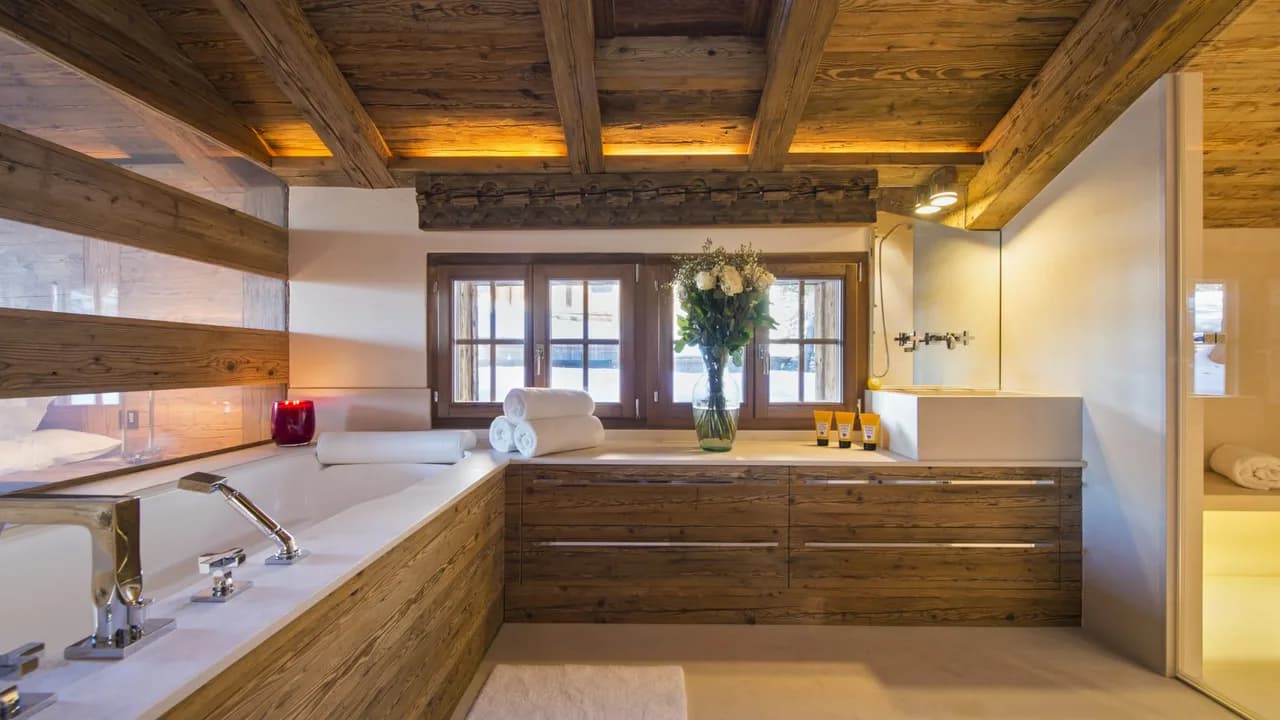 Contemporary chalet sits majestically on the banks of a pond photo 5