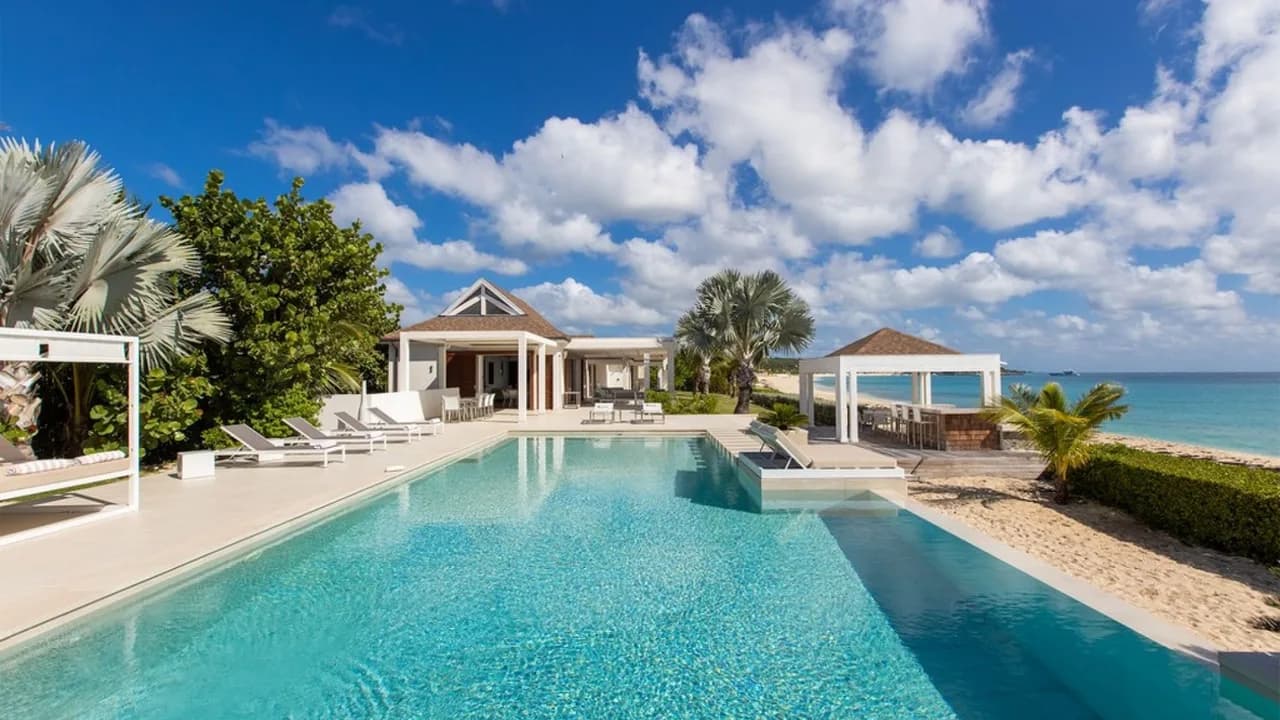 Deluxe 4BR beachfront villa with sunset views photo 2