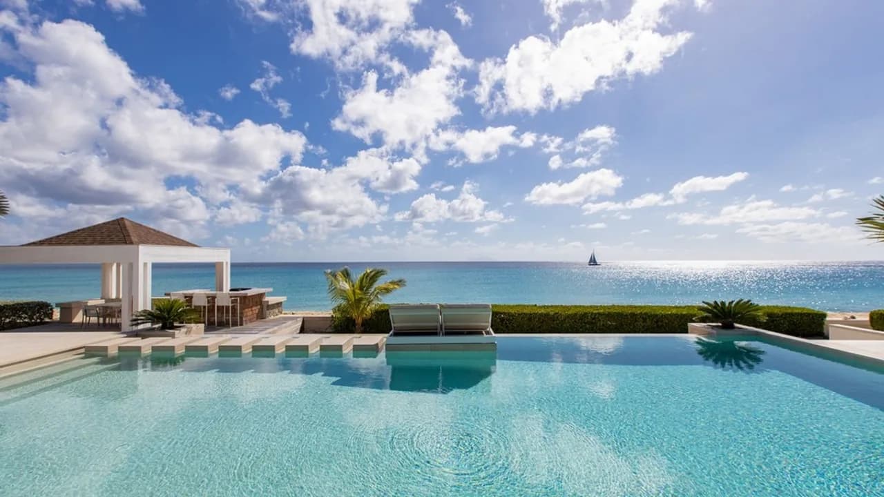 Deluxe 4BR beachfront villa with sunset views photo 3