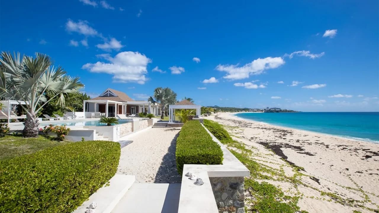 Deluxe 4BR beachfront villa with sunset views photo 4