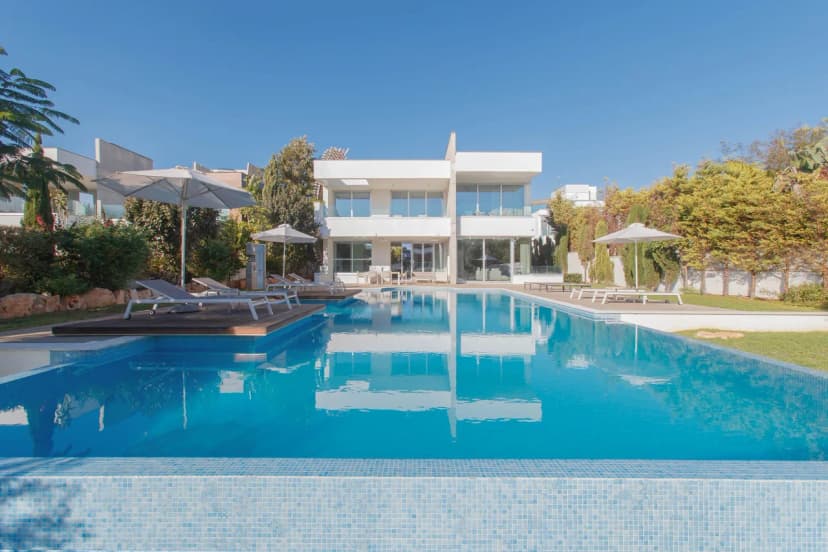 Elegant Seafront Retreat With Two Pools