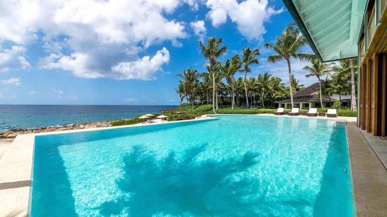 Infinity Pool Overlooking Caribbean Sea photo 2