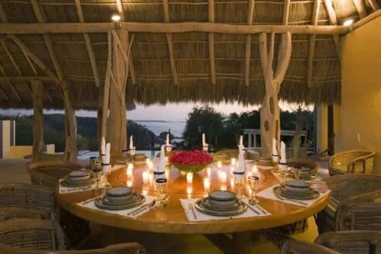 Calming Coastal Retreat With Palapa Roofs photo 5