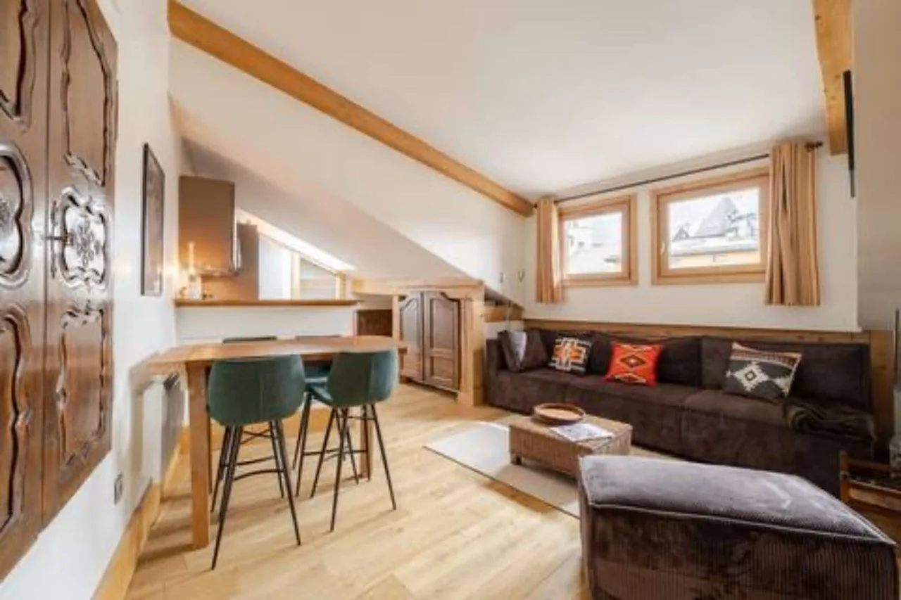 Central Alpine Attic With Fireplace Glow photo 2