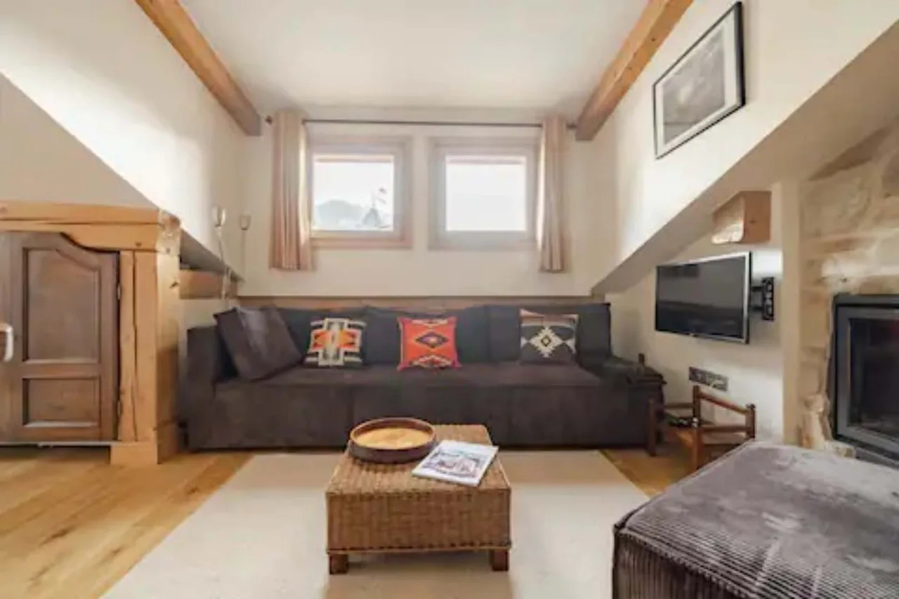 Central Alpine Attic With Fireplace Glow photo 4