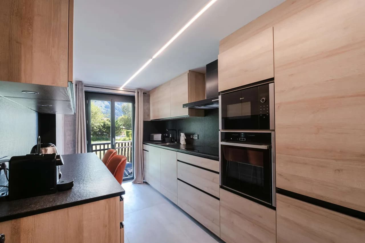 Modern Chalet Overlooking Alpine Mountain Peaks photo 5