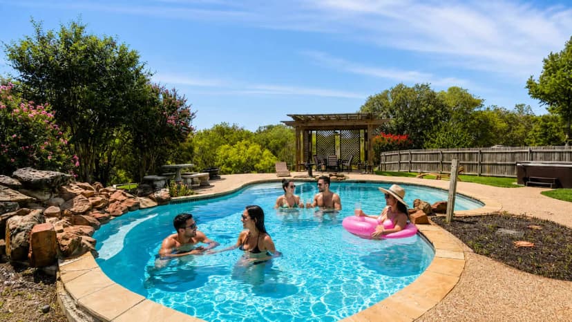 Elite 4BR/2B Home with Hot Tub, Pool, and BBQ