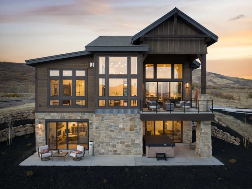 Breathtaking mountain and lake views, expansive balcony, private hot tub, BBQ grill. Perfect summer!