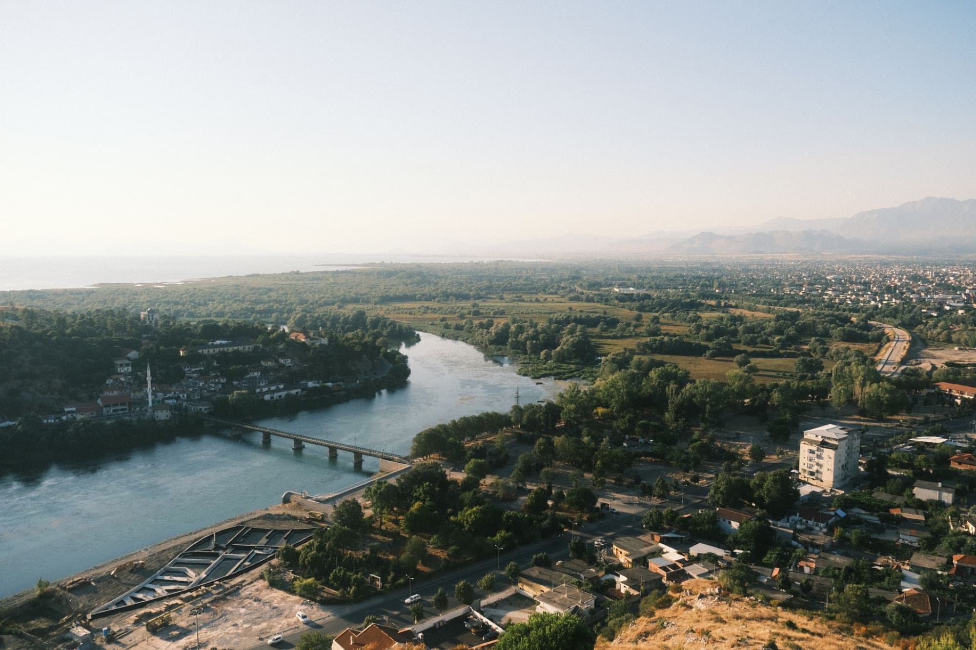 A beautiful aerial view capturing the serene landscape and river in Shkodra, Albania.