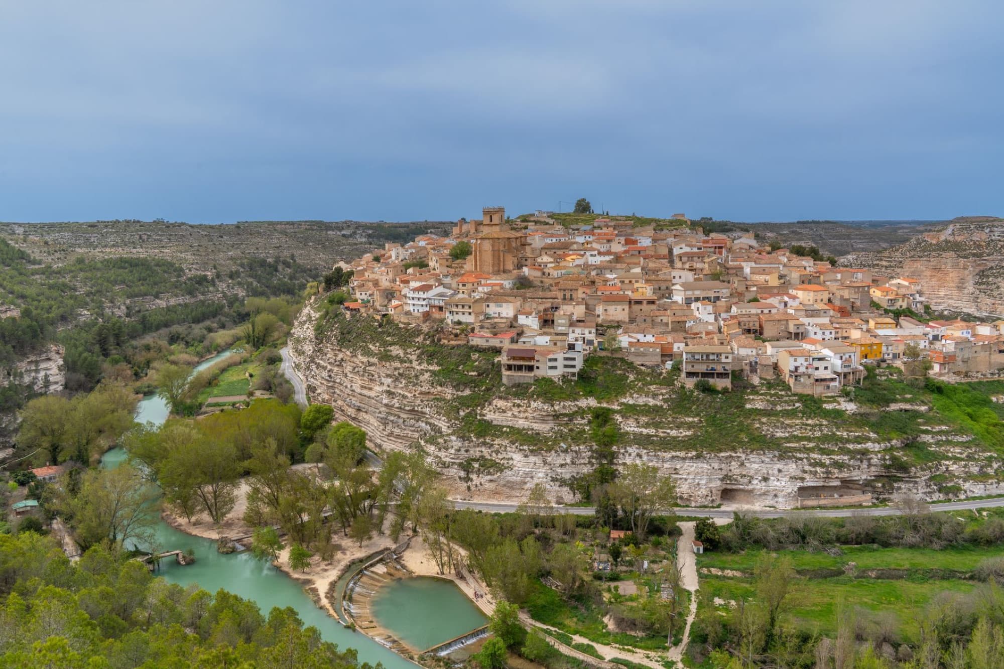 Aerial view of Jorquera, a historic town in Castilla-La Mancha, Spain, overlooking the Júcar River.
