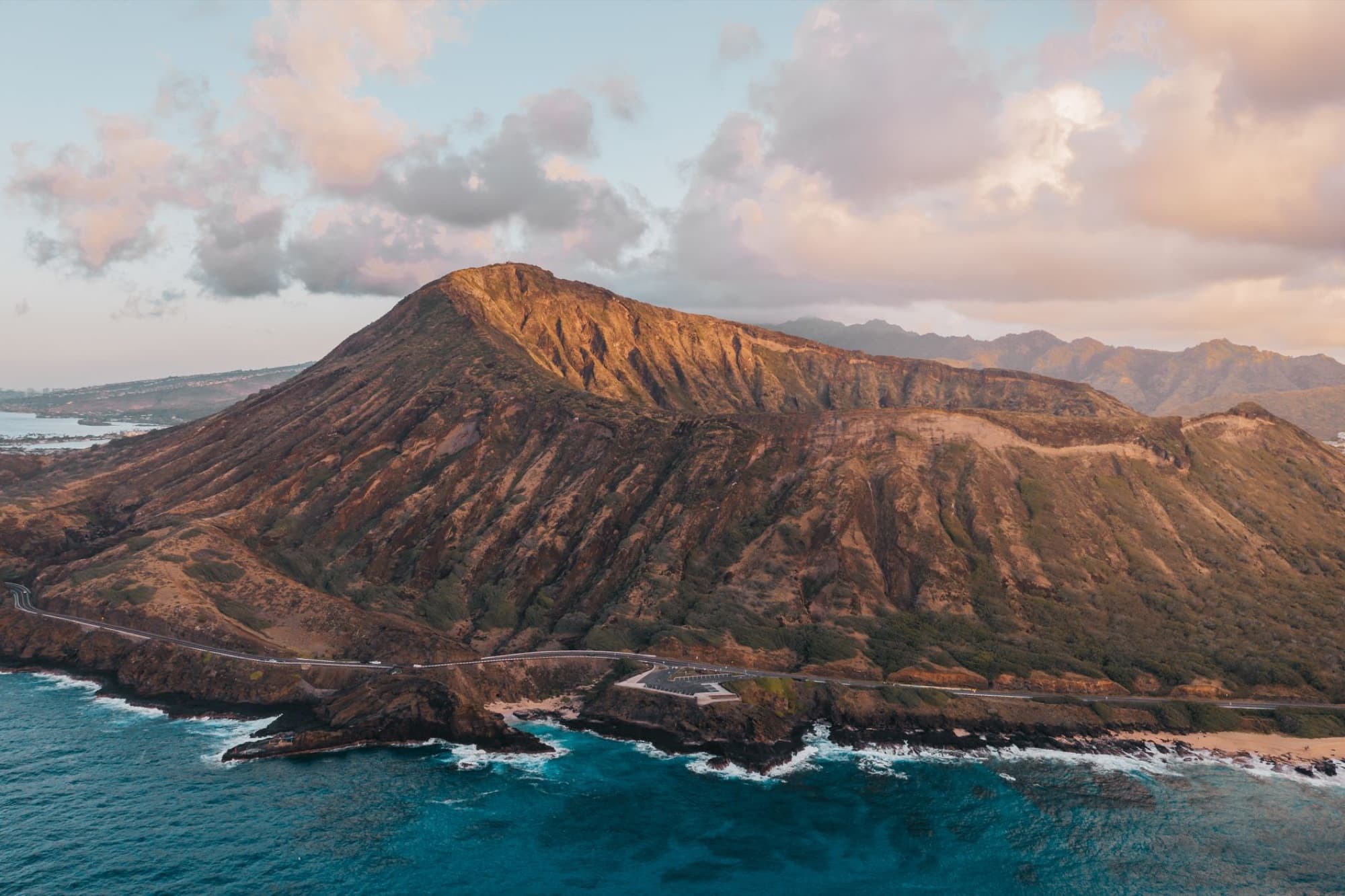 Epic aerial view of Koko Head in Hawaii, highlighting its volcanic landscape and scenic ocean backdrop.