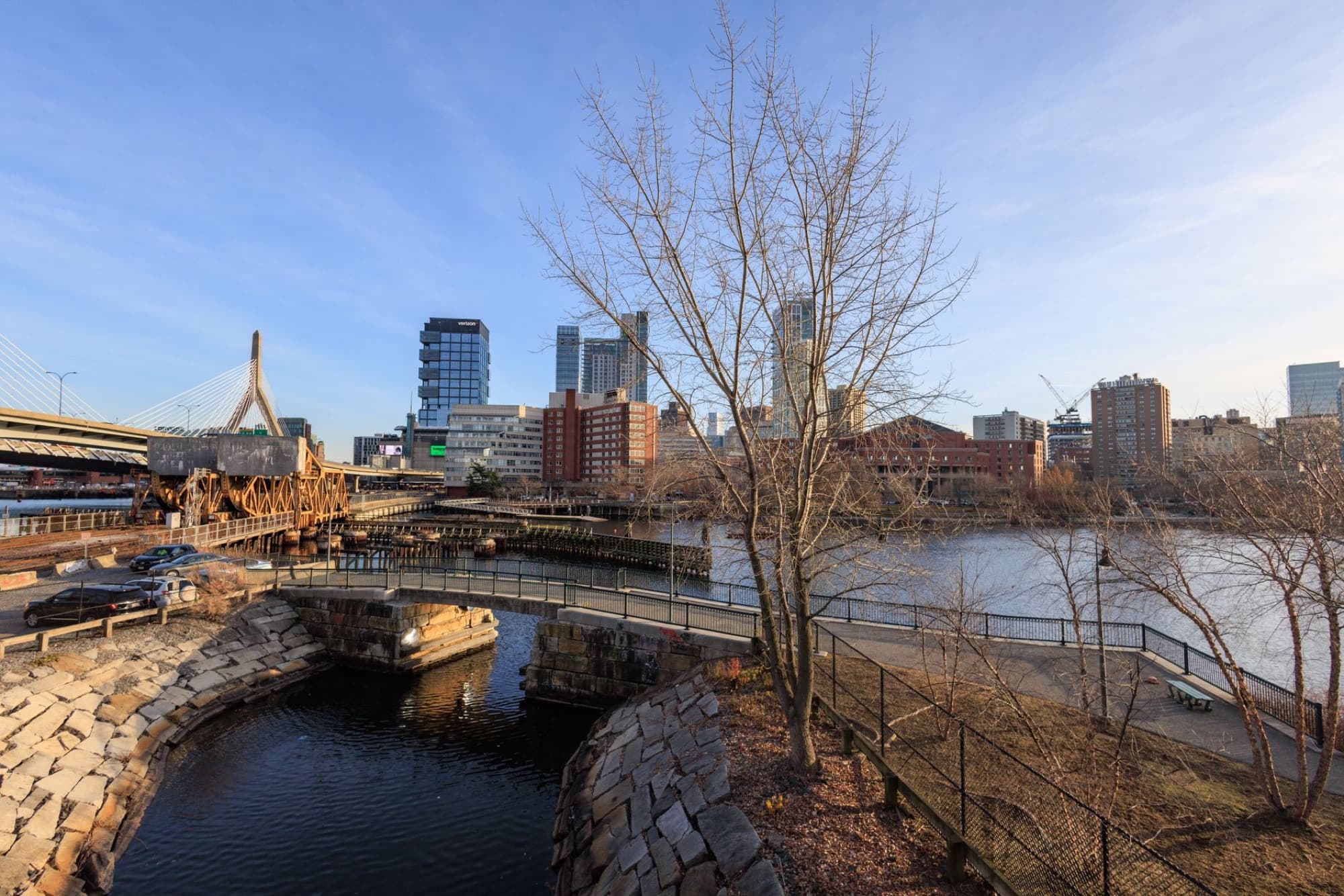 Captivating view of Boston's skyline with the river in the foreground, capturing the city's essence.