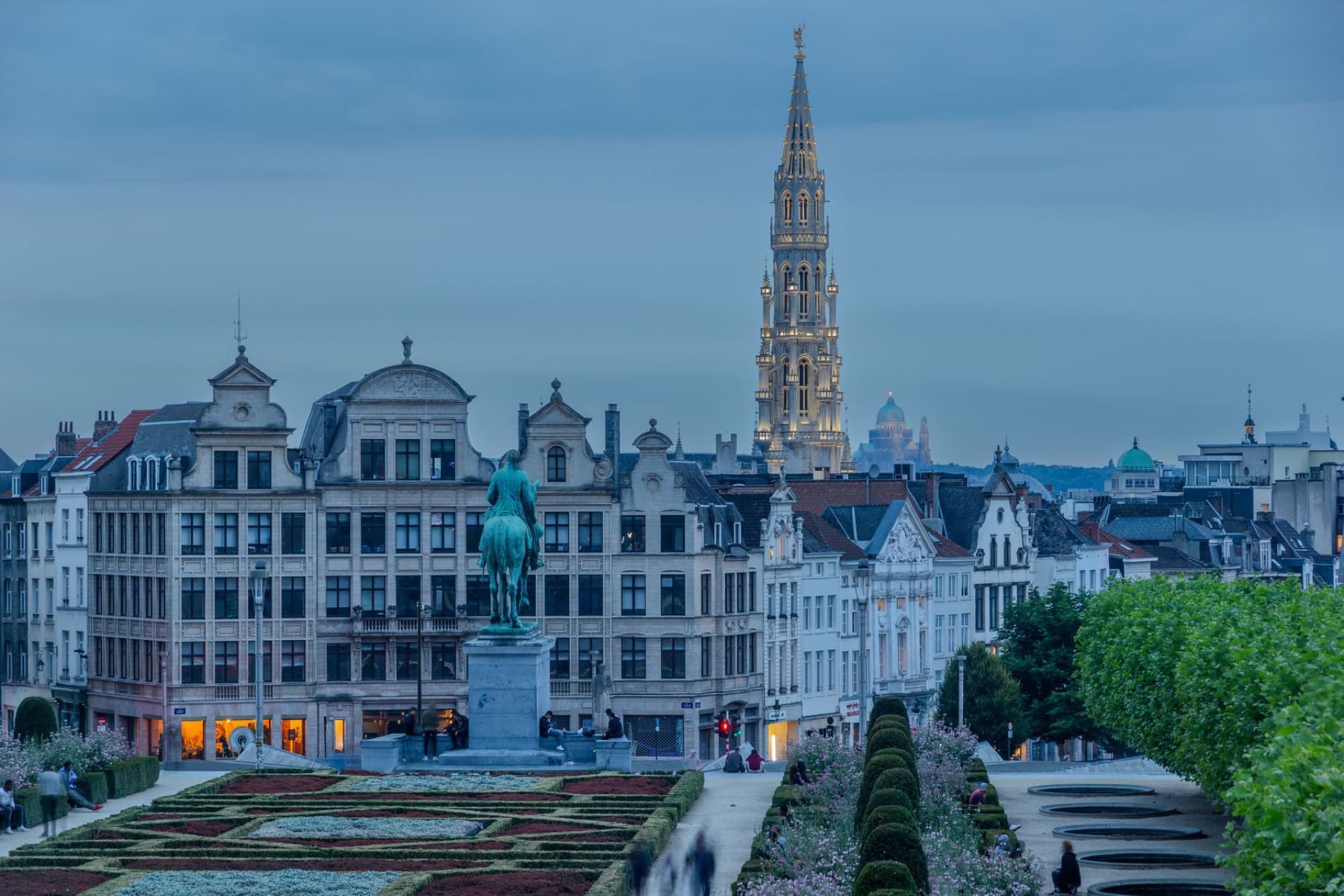 Scenic view of Mont des Arts, Brussels, featuring the iconic Town Hall tower at dusk.