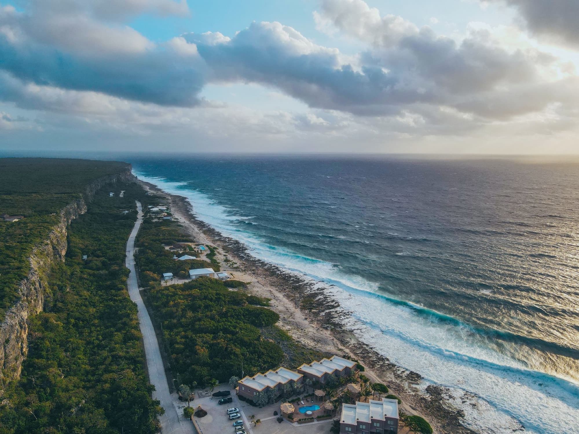 Stunning aerial view of Breakers coastline, Cayman Islands, capturing the ocean and beach.