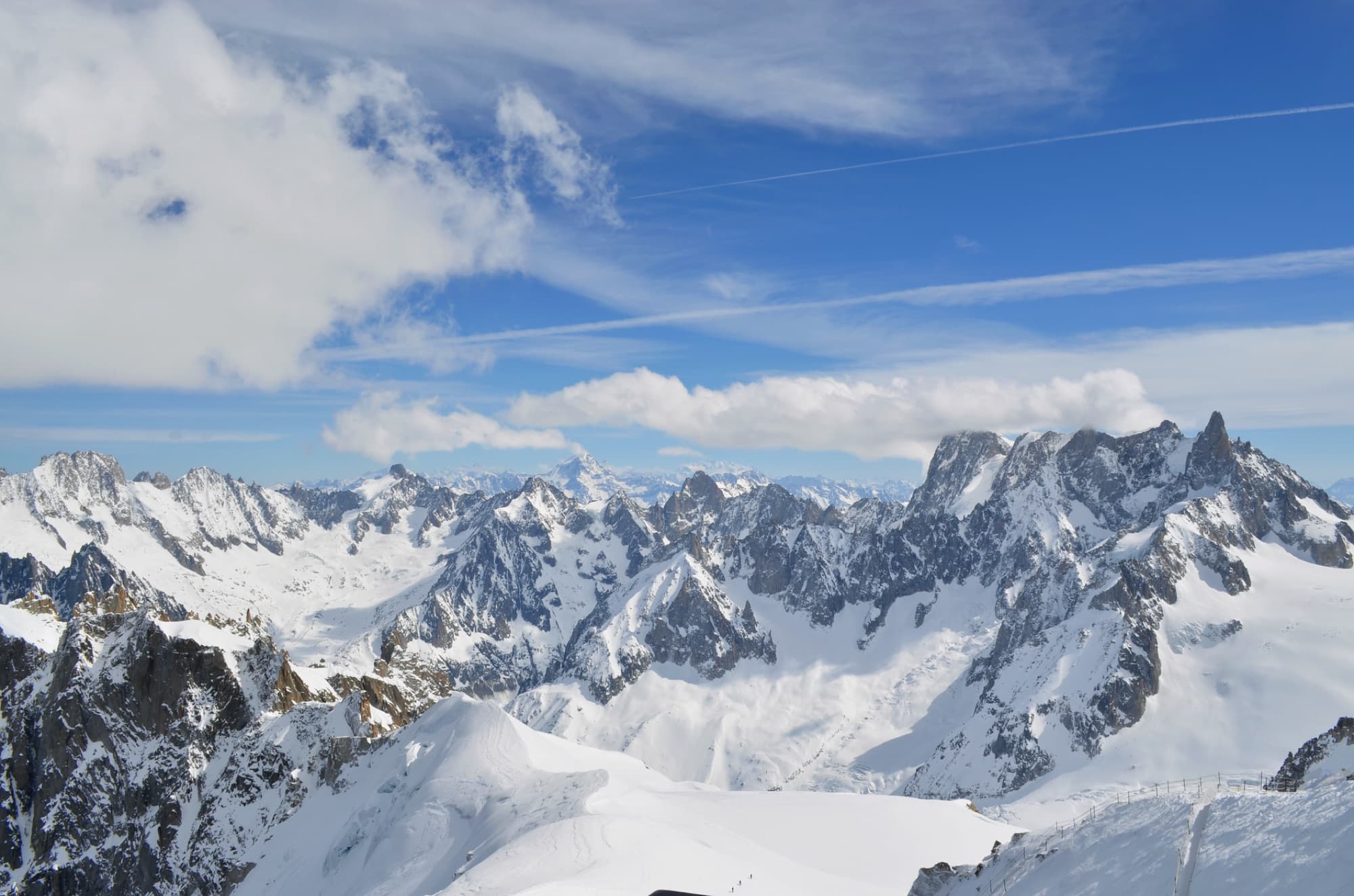 A breathtaking aerial view of the snowy Mont Blanc mountains in Chamonix, France.