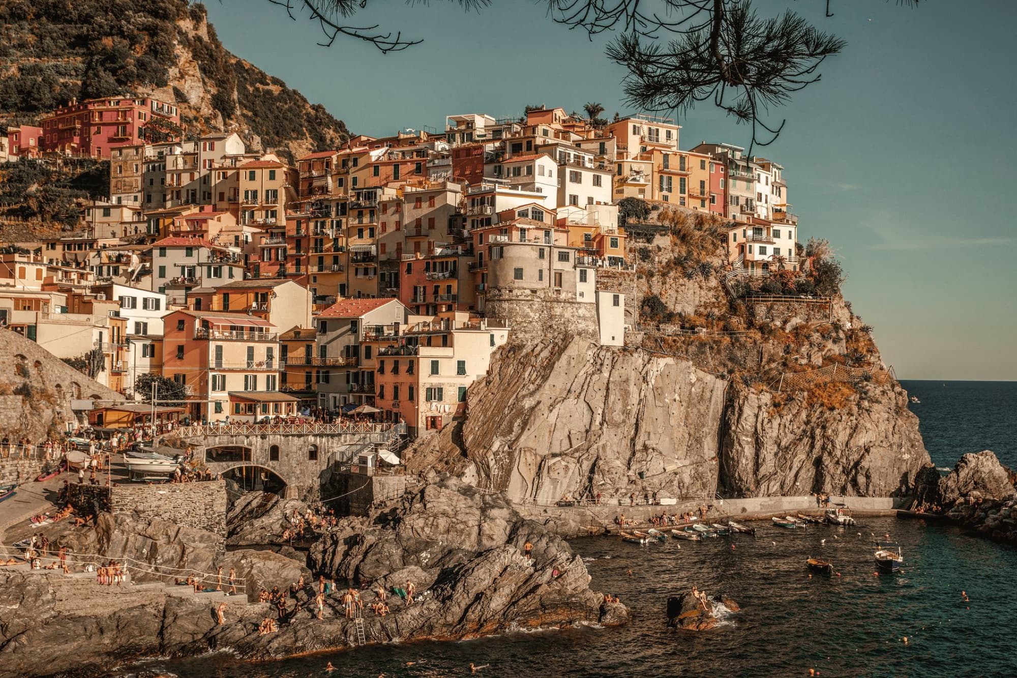 Charming colorful town on rugged cliffs by the sea in Cinque Terre, Italy.