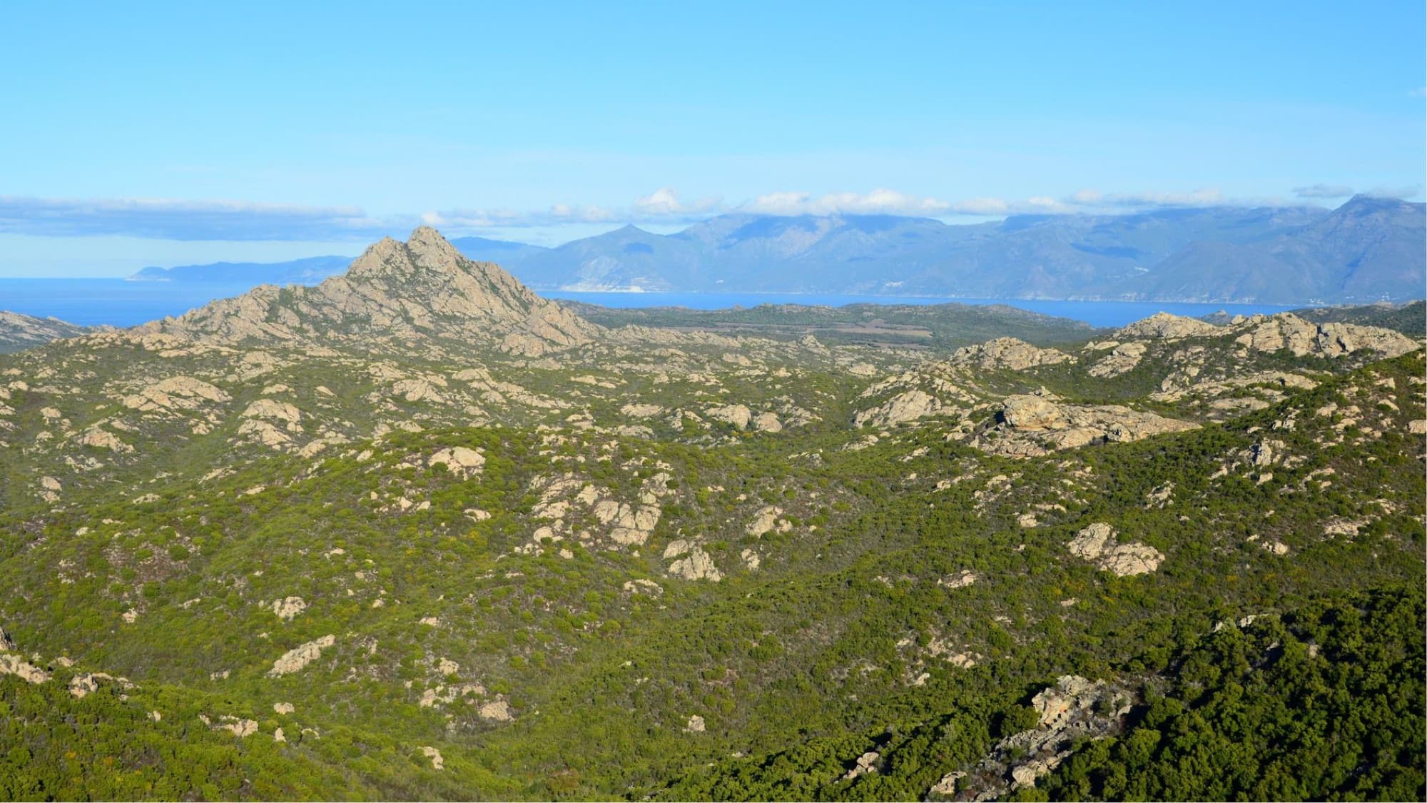 Stunning aerial view of the rugged mountain landscape in Santo-Pietro-di-Tenda, Corsica, France.