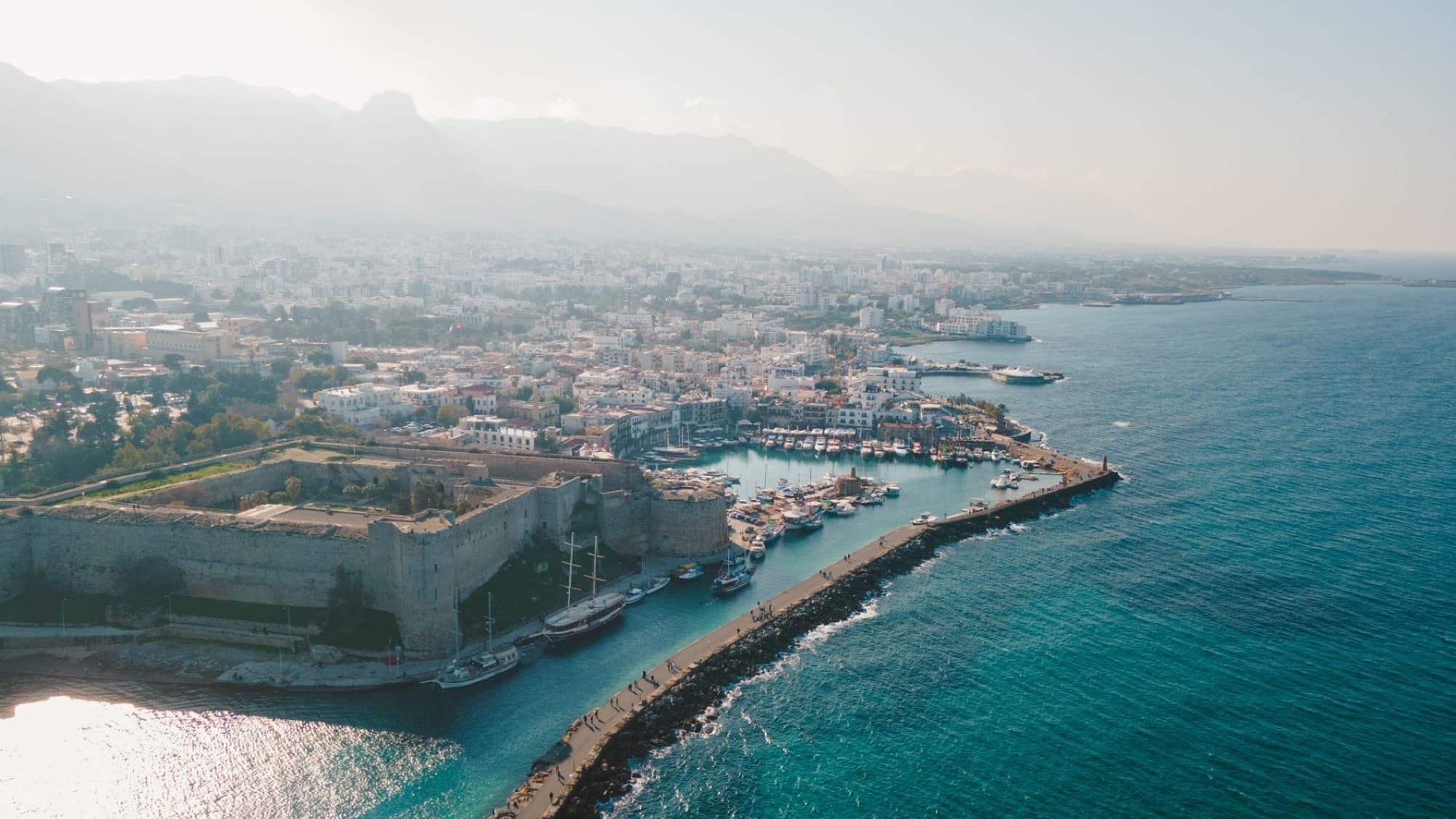 A breathtaking aerial view of Kyrenia Castle and the bustling harbor in Cyprus.