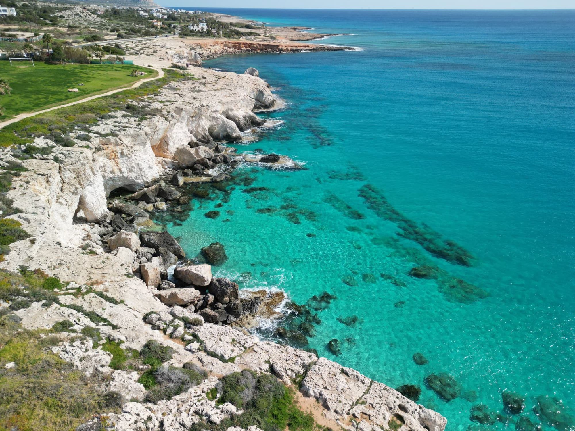 Stunning aerial photo of Ayia Napa's rocky coast with turquoise sea in Cyprus.