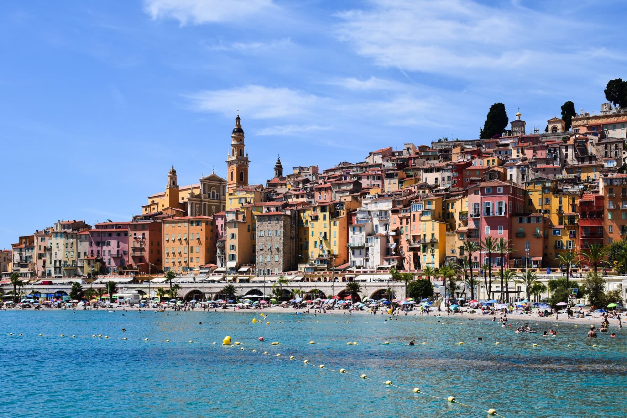 Stunning view of Menton, a colorful town on the French Riviera seaside with vibrant buildings.