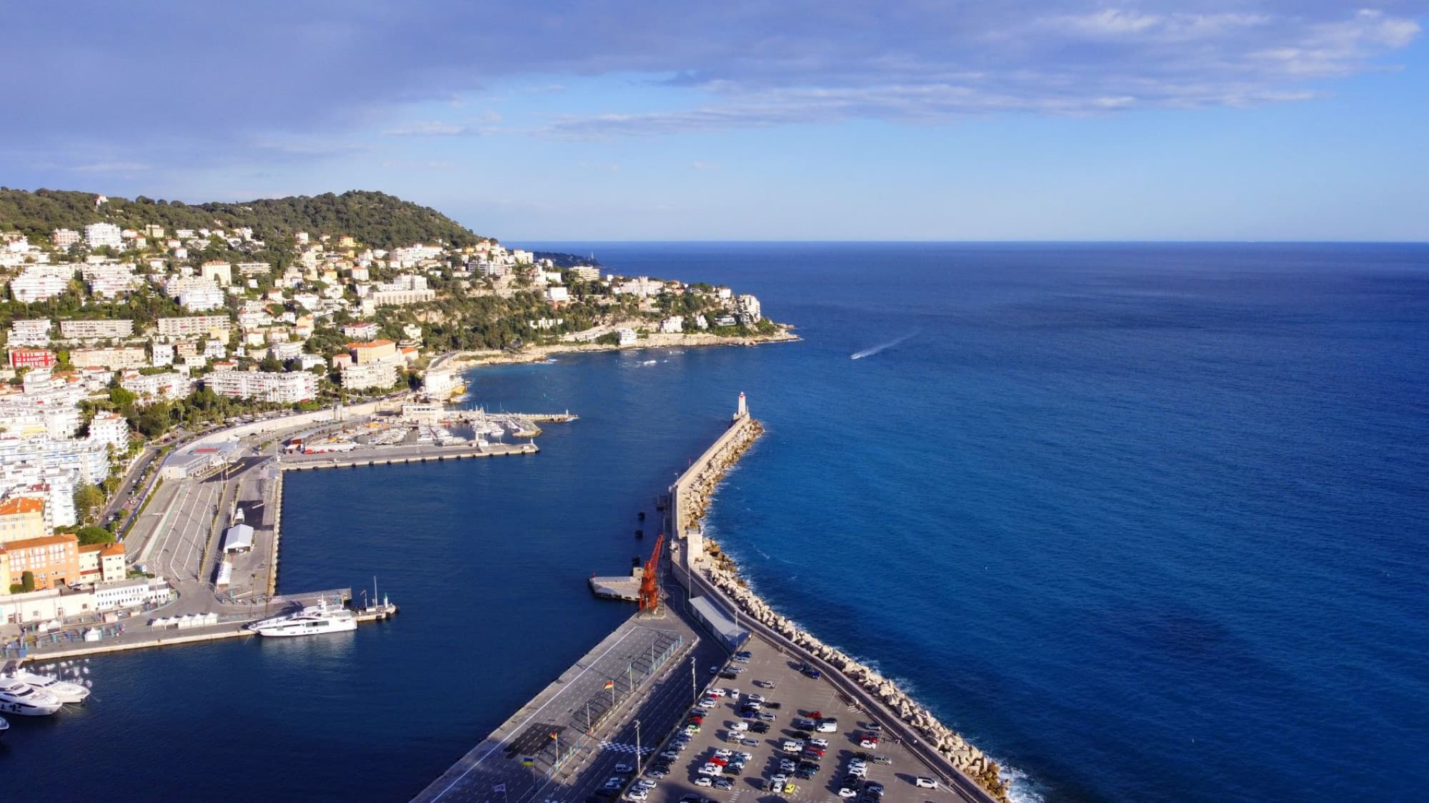 A stunning aerial view of the Nice coastline with a scenic harbor in Provence-Alpes-Côte d'Azur, France.