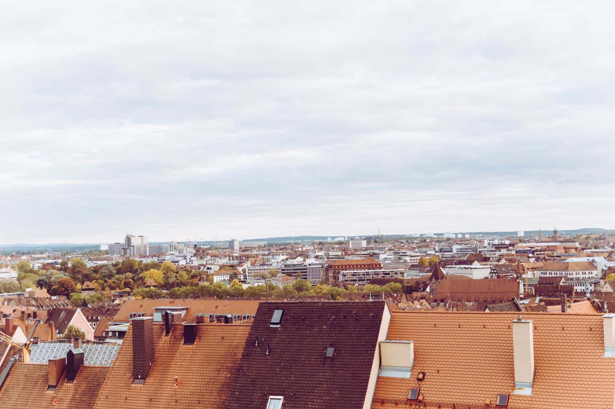 Discover the charming rooftops and urban skyline of Nürnberg, Germany from a high vantage point.