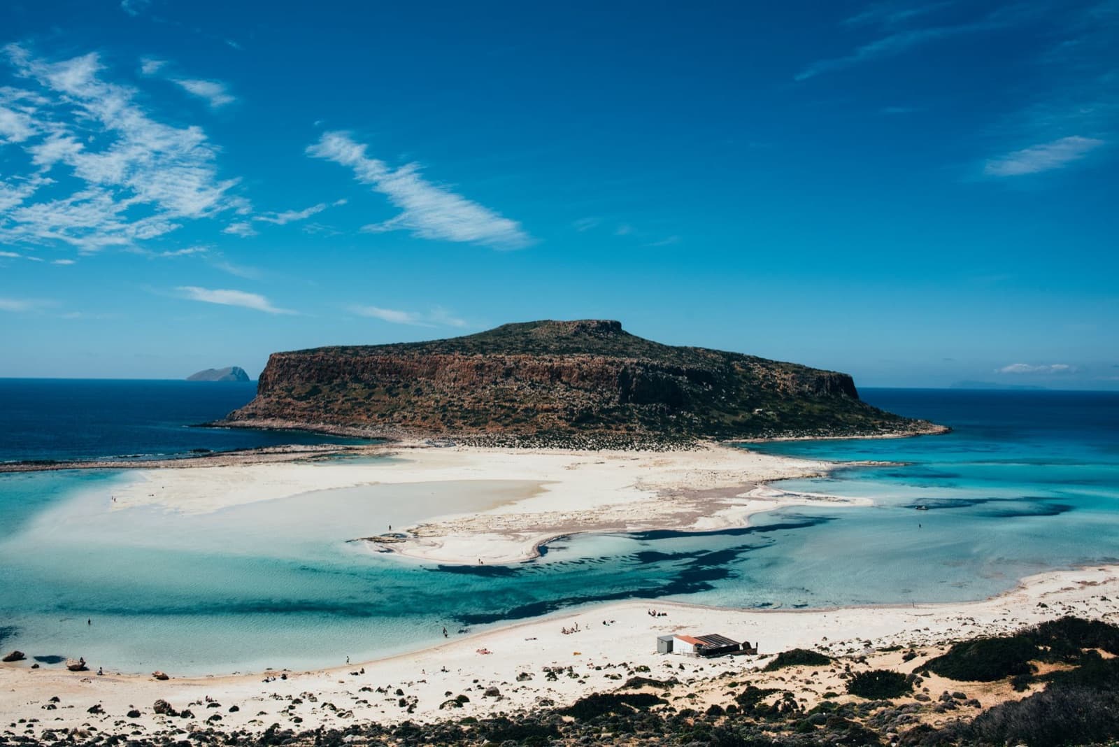Aerial view of the beautiful Balos Beach Lagoon in Crete, Greece, showcasing turquoise waters and scenic landscape.