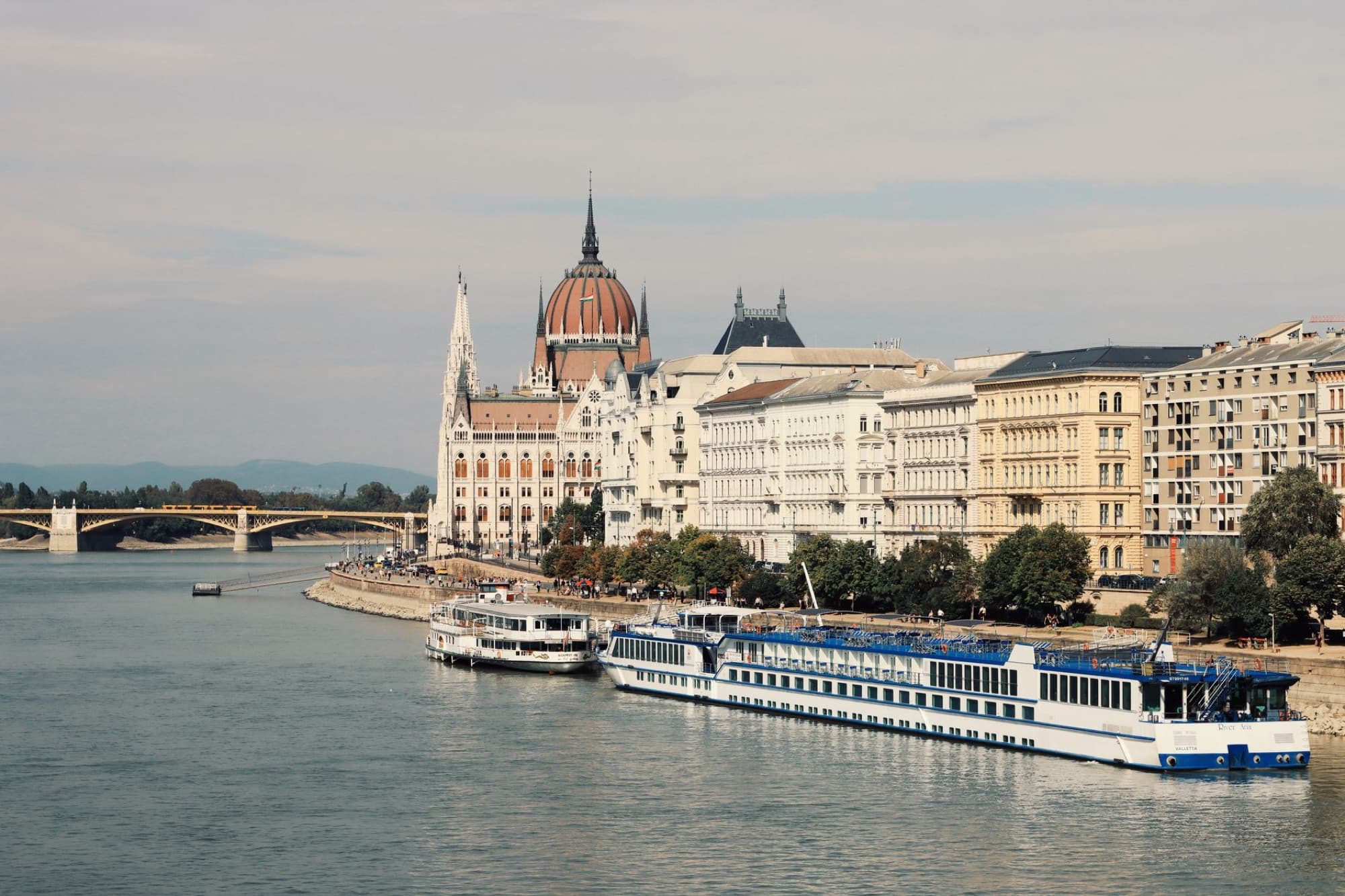 Scenic view of the Hungarian Parliament buildings alongside the Danube River in Budapest, Hungary.