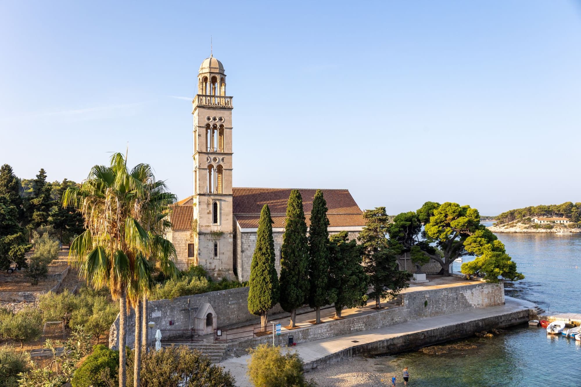 Explore the serene beauty of the Franciscan Monastery on the Hvar Island coastline in Croatia.