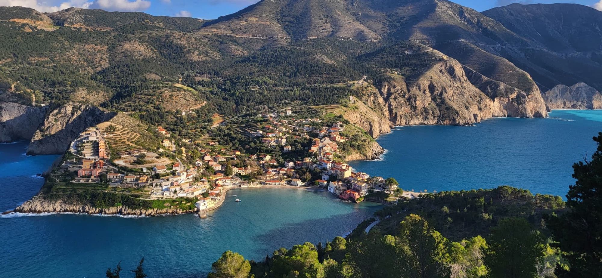 Breathtaking aerial view of Asos village nestled on the coast of Kefalonia, Greece.