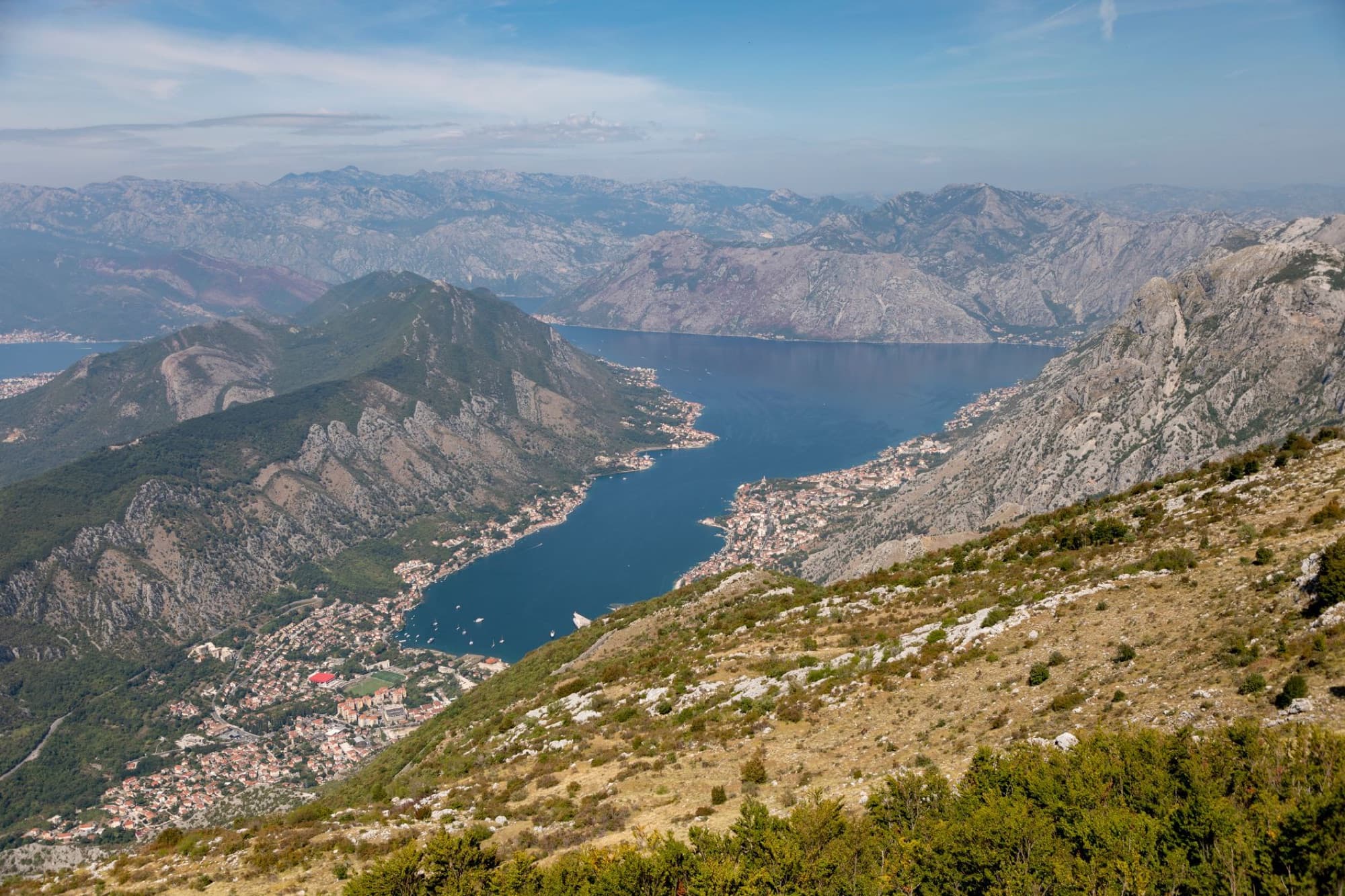 Stunning aerial view of Kotor Bay and surrounding mountains in Montenegro.