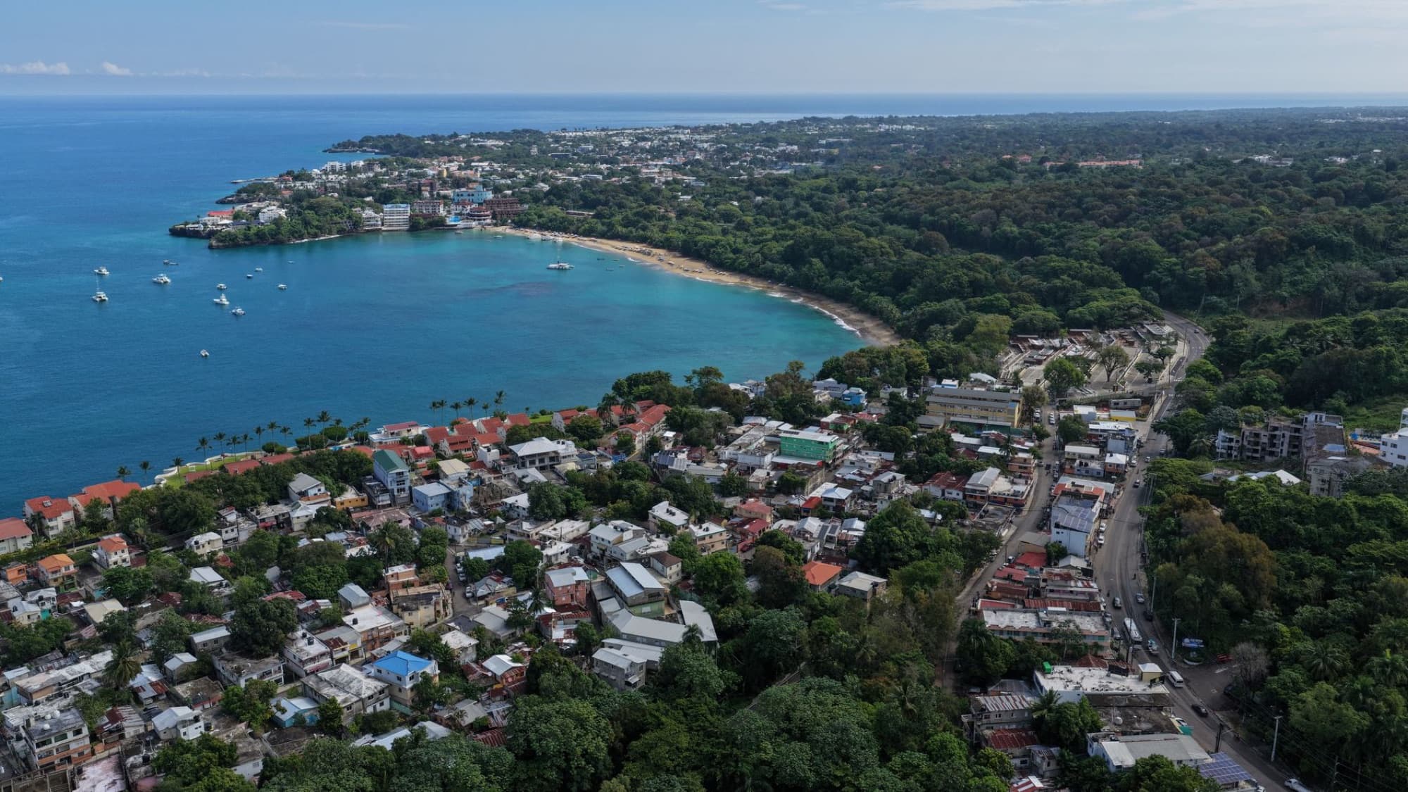 Scenic aerial shot of Sosúa Bay, showcasing vibrant coastal landscape in Dominican Republic.